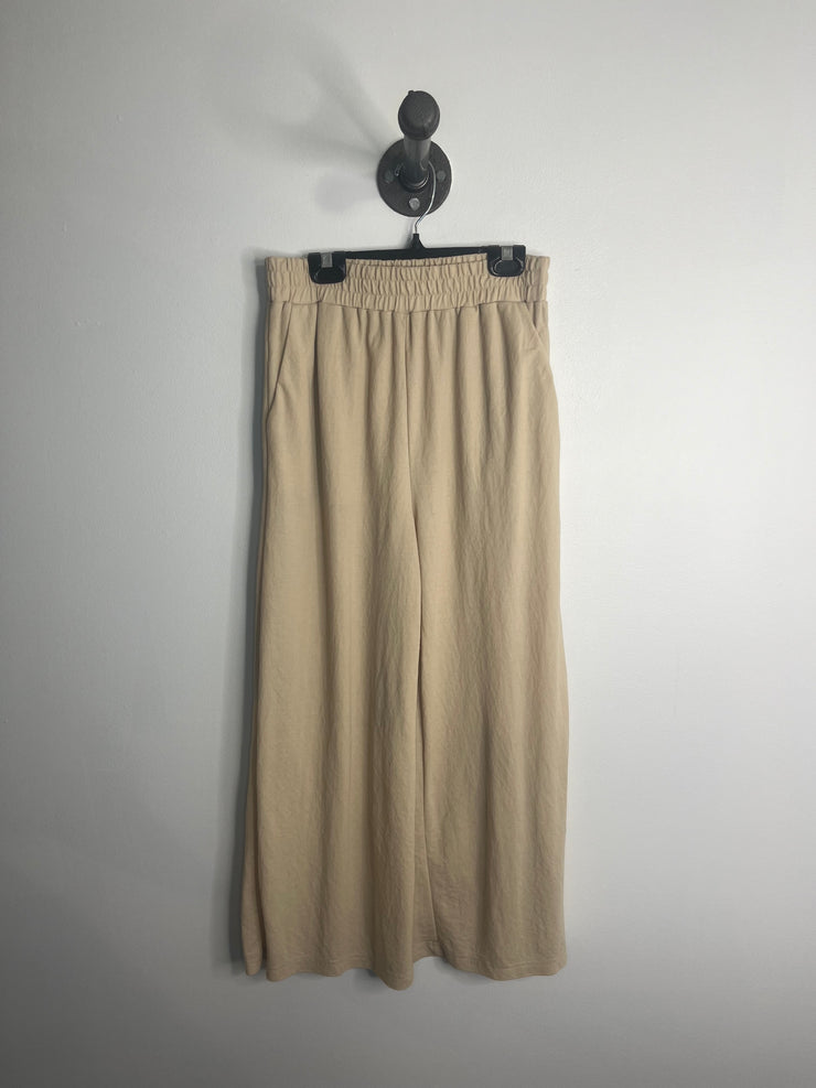 Pantalones anchos recortados en color beige MNG