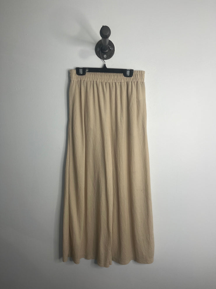 Pantalones anchos recortados en color beige MNG