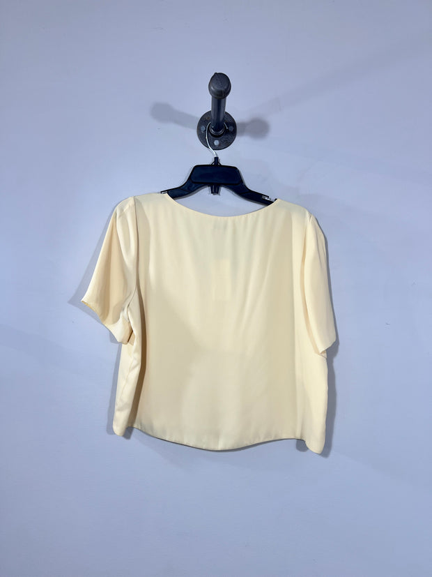 Blusa tipo camiseta amarilla Babaton