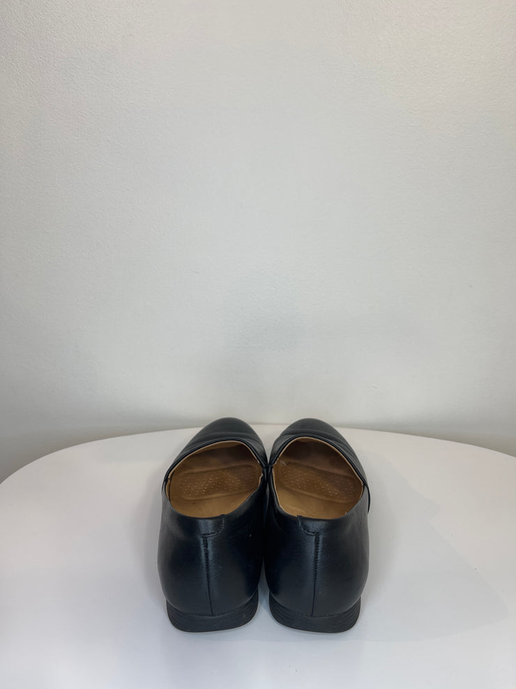 Dansko Black Leather Slip-Ons