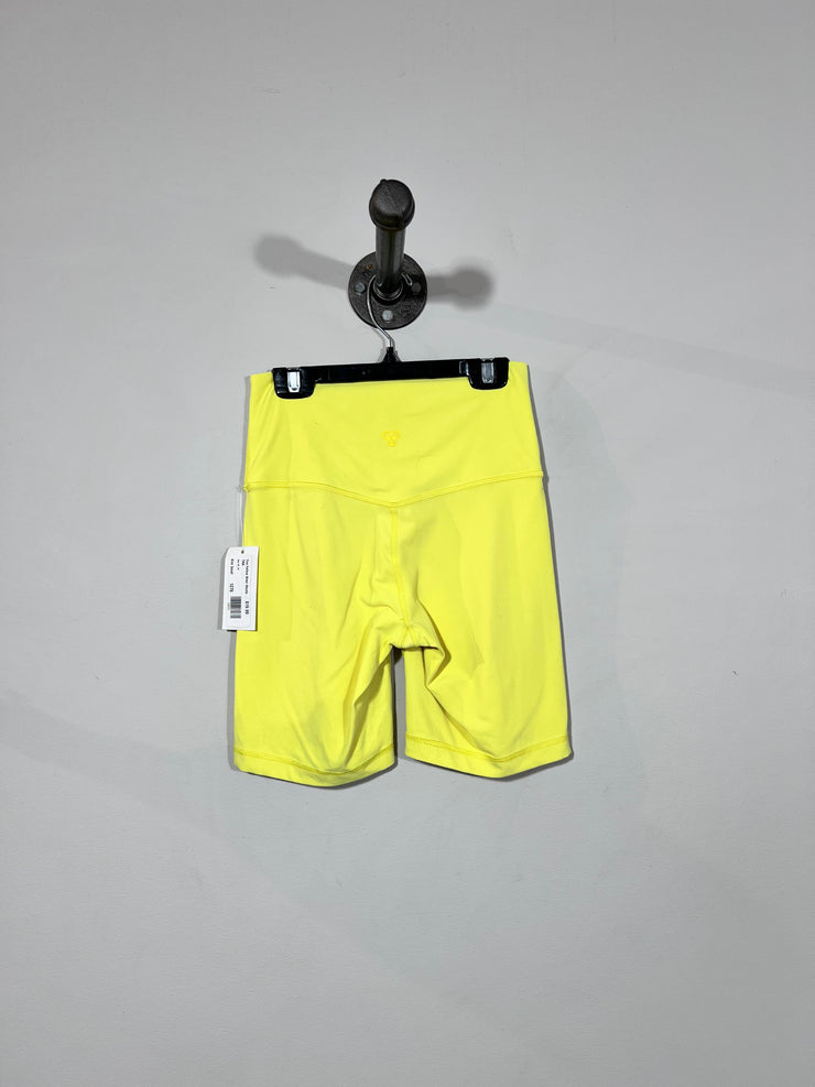 Pantalones cortos de ciclista amarillos Tna