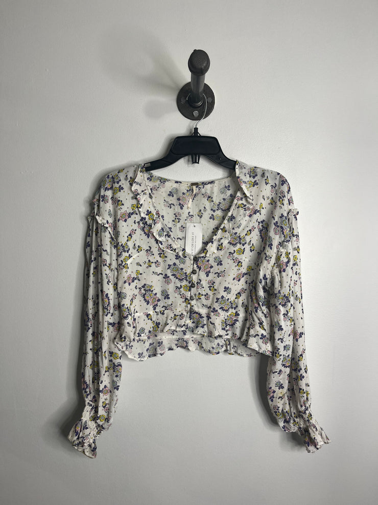 Conjunto floral blanco de Free People