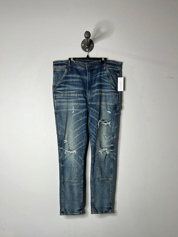 AG Distressed Skinny Jeans